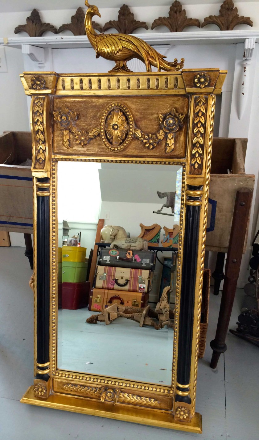 mirror with golden peacock